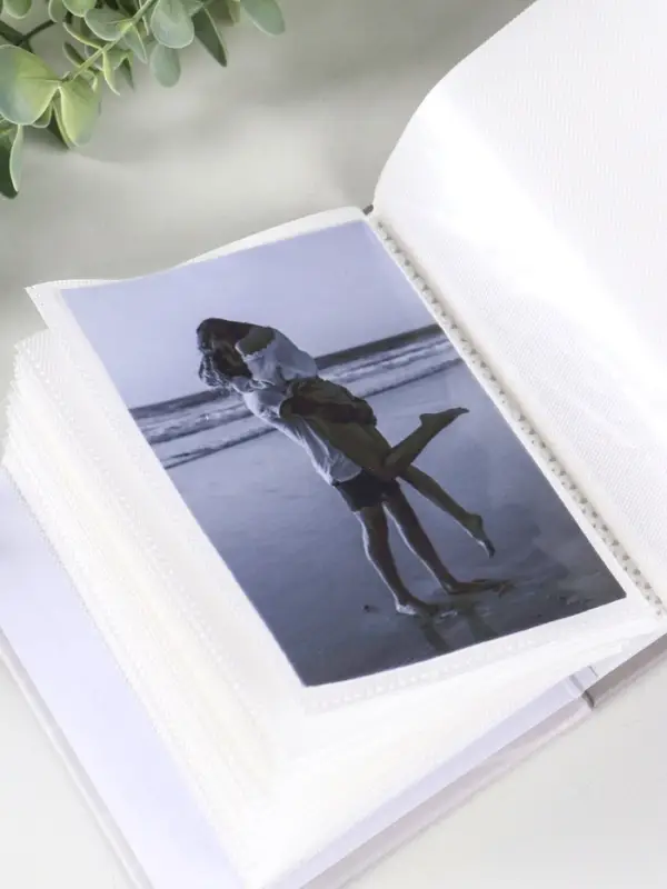 Фотоальбом "Жирафик"  100ф 10X15см, ПП карм.