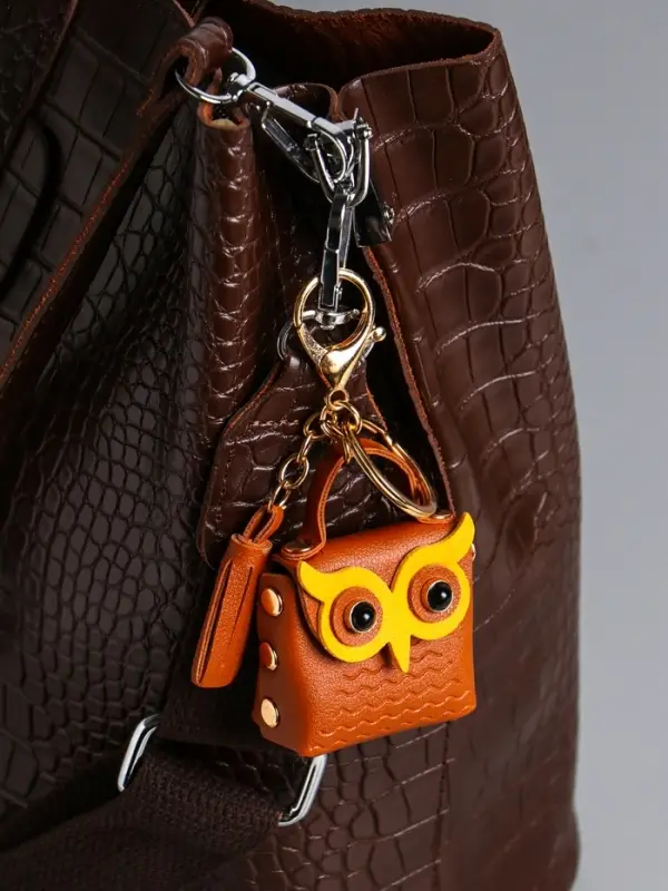Брелок кожзам с карабином, с кистью Брелок кожзам с карабином, с кистью "Сумочка. Сова" карамель 5,2х2,5х6 см