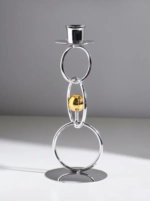 Подсвечник металл на 1 свечу  Подсвечник металл на 1 свечу "Кольца и шарики" серебро с золотом d=2,5 см 9х9х22 см