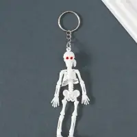 Брелок пластик "Скелет в бандане" белый 10х3,5х1 см