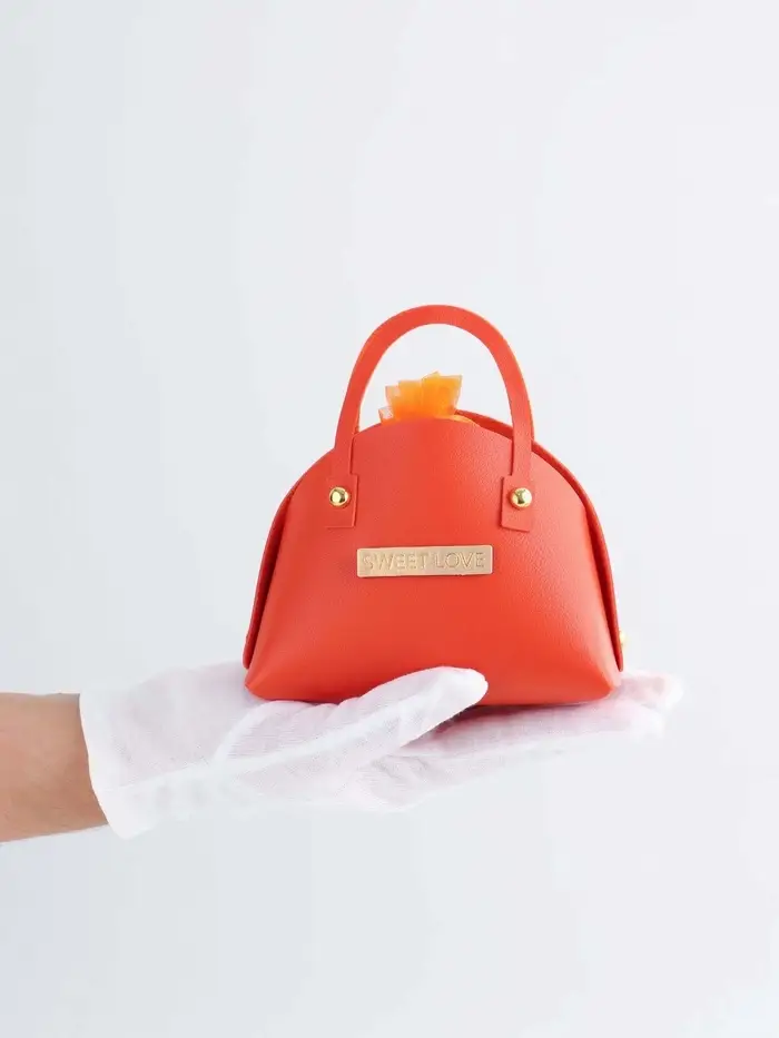 Кожанная подарочная сумочка 14 х 6,5 х 12,8 см оранжевая