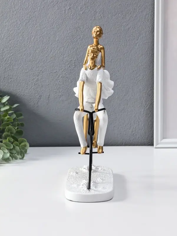 Сувенир полистоун "Парочка на велосипеде" бело-золотой 8,5х23х29 см