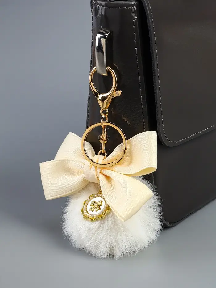 Пушистик на кольце "Бант с подвеской" белый 12х5х5 см