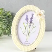 Фоторамка пластик 13х18 см "Белый жемчуг с цветком" овальная Фоторамка пластик 13х18 см "Белый жемчуг с цветком" овальная