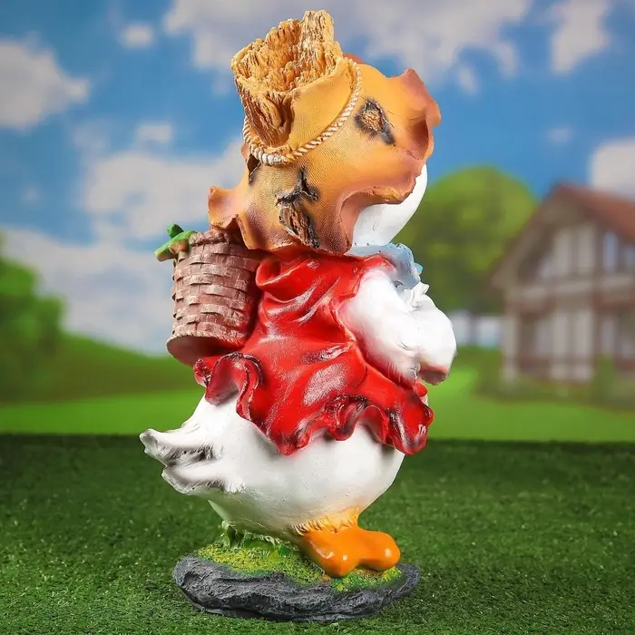 Садовая фигура из полистоуна «Утёнок с кукурузой», 48×22×26 см