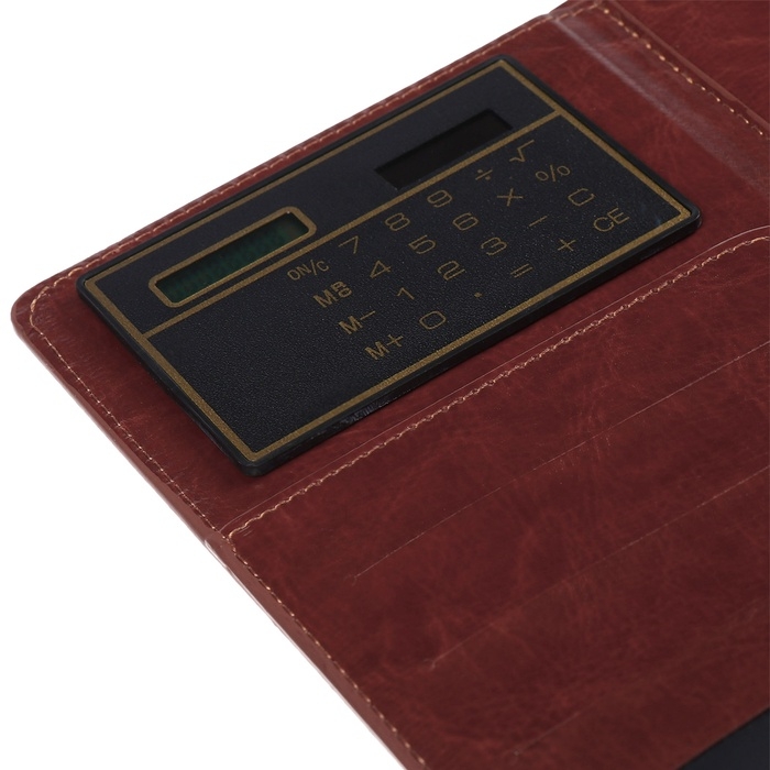 Ежедневник недатированный,формат А5, 140 листов, в клетку, обложка кожзам, с хлястиком, с калькулятором, коричневый Ежедневник недатированный,формат А5, 140 листов, в клетку, обложка кожзам, с хлястиком, с калькулятором, коричневый