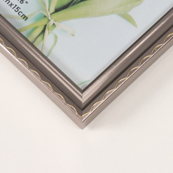 Фоторамка пластик 10х15 см Фоторамка пластик 10х15 см "Волнистая линия на серебре" 1,3х12х17 см