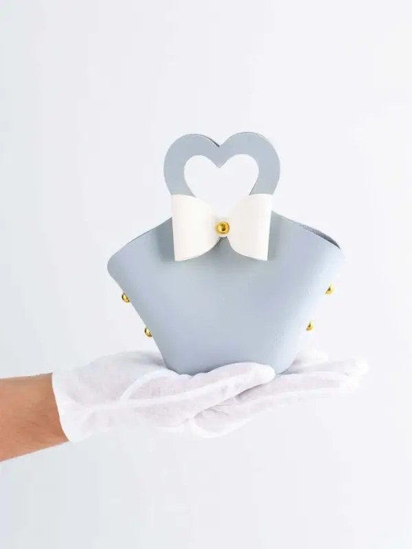 Кожанная подарочная сумочка 10,5 х 5 х 6 см небесно-голубая Кожанная подарочная сумочка 10,5 х 5 х 6 см небесно-голубая