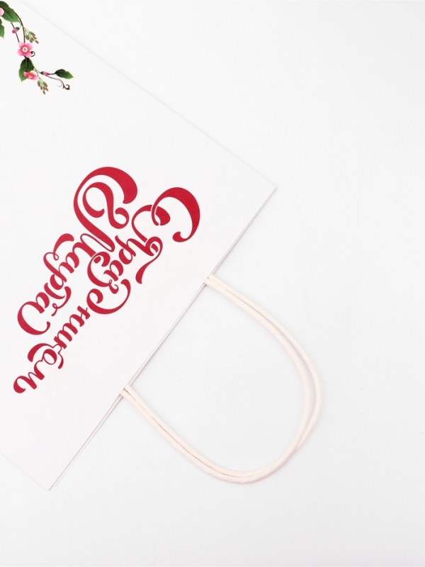 Пакет подарочный крафт  Пакет подарочный крафт "С Праздником 8 марта!" 21 х 11 х 27 См