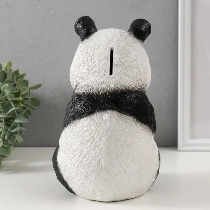 Копилка Копилка "Панда жующая " высота 23 см, ширина 16 см, длина 14,5 см.
