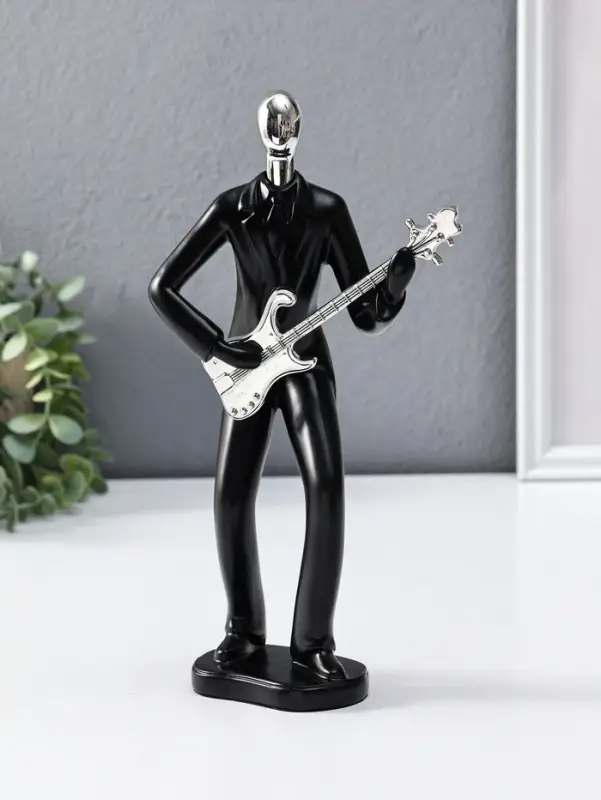 Сувенир полистоун "Гитарист" чёрный с серебром 6,5х15,2х27,5 см