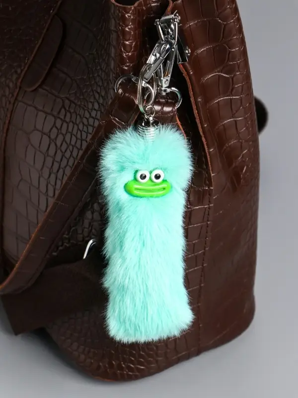 Пушистик на кольце "Чудик" мятный 19х4х4 см