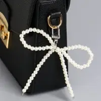 Брелок на карабине "Жемчужный бант" бусины d=0,8 см 9,5х11х1,6 см Брелок на карабине "Жемчужный бант" бусины d=0,8 см 9,5х11х1,6 см