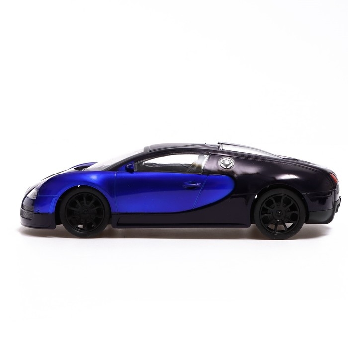 Машина радиоуправляемая «Купе», в комплекте педали и руль, работает от батареек, цвет синий Машина радиоуправляемая «Купе», в комплекте педали и руль, работает от батареек, цвет синий