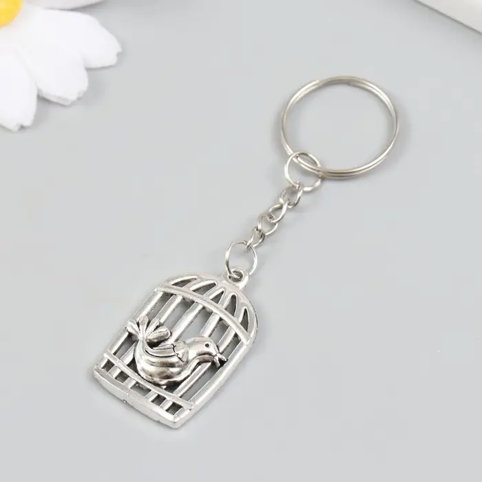 Брелок металл "Птица у клетки" серебро 2,2х3,6 см