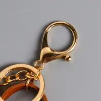 Брелок кожзам с карабином, с кистью "Сумочка. Сова" карамель 5,2х2,5х6 см Брелок кожзам с карабином, с кистью "Сумочка. Сова" карамель 5,2х2,5х6 см