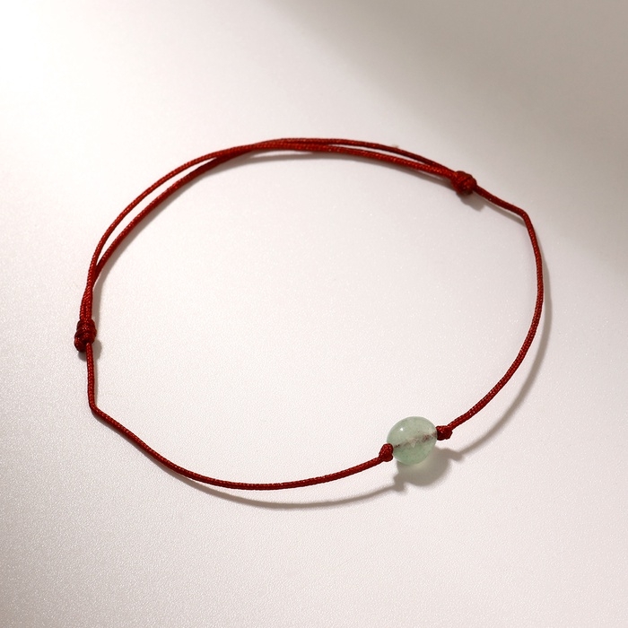 Браслет желаний «Нефрит» на бордовой нити, длина регулируется Браслет желаний «Нефрит» на бордовой нити, длина регулируется
