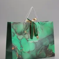 Пакет подарочный "Мрамор", зеленый с бантиком, 43 х 32 х 14 см