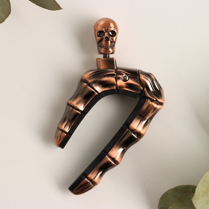 Каподастр для гитары Music Life Череп, бронзовый Каподастр для гитары Music Life Череп, бронзовый