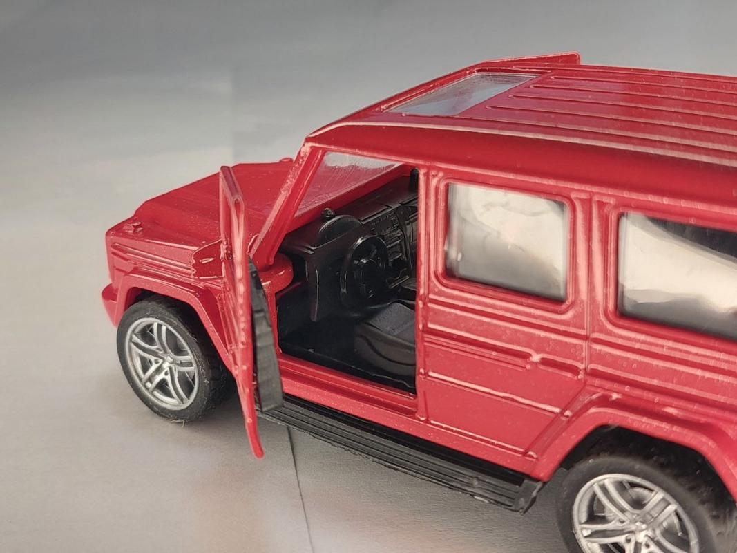 Игрушка машина джип открываются двери