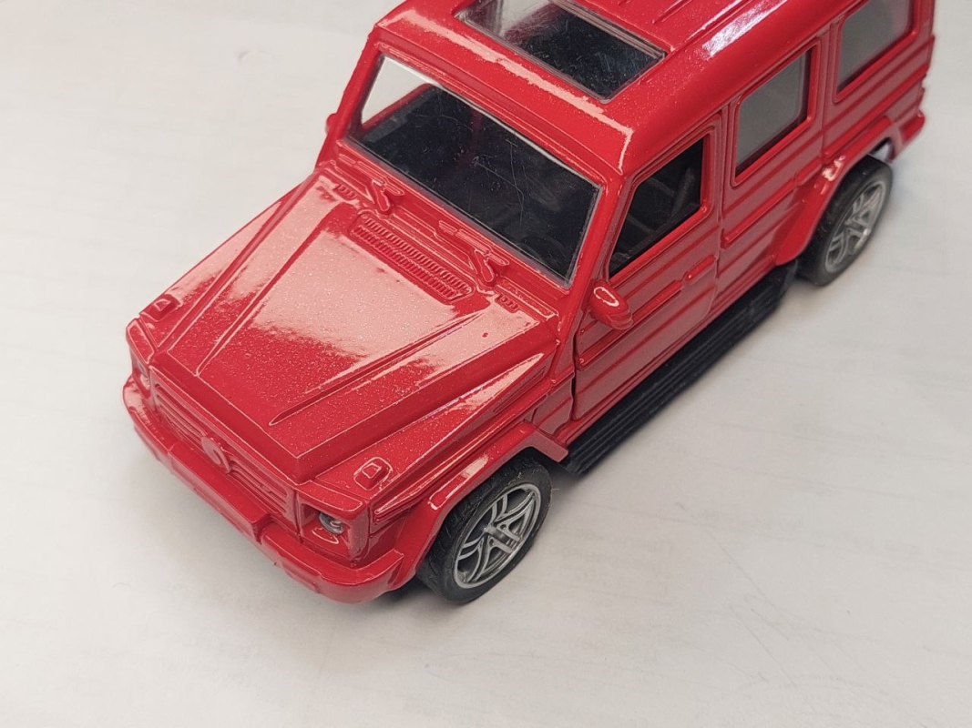 Игрушка машина джип открываются двери