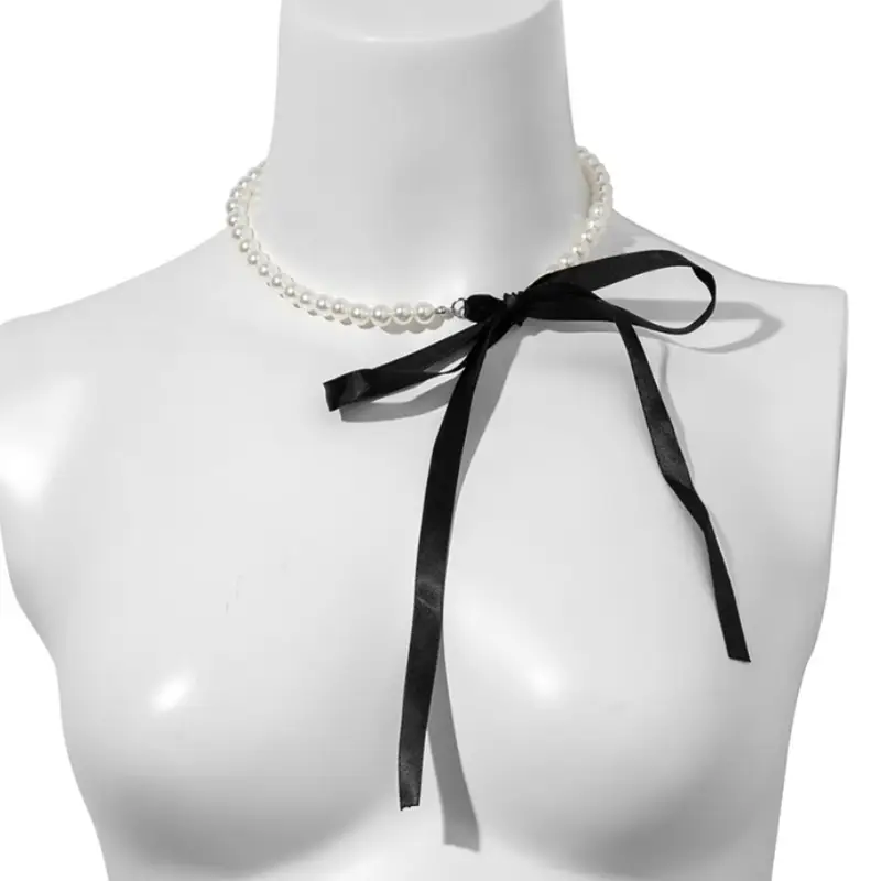 Чокер на шею из жемчуга с черным бантом