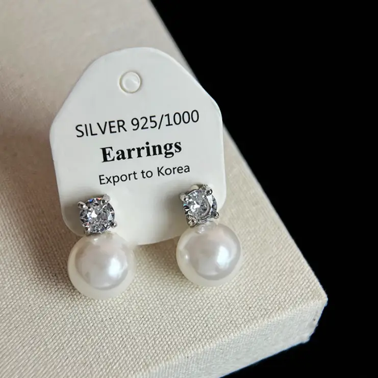 Серьги гвоздики с кристаллами с жемчужинами