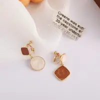 Клипсы круглые коричнево-бежевые эсаль