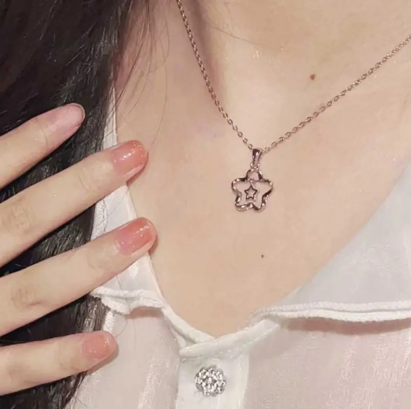 Подвеска Цветок со звездой на цепочке серебристая