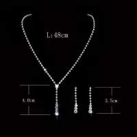 Набор колье на шею и серьги с кристаллами серебристое