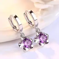 Серьги колечки с цветком серебристые