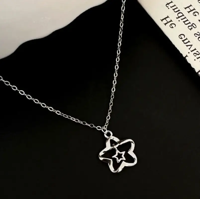 Подвеска Цветок со звездой на цепочке серебристая