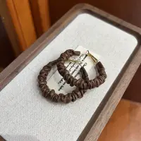 Серьги кольца из экокожи коричневые