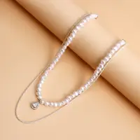 Колье на шею с жемчугом и подвеской кристалл