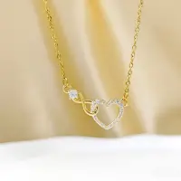 Подвеска Сердечко и бесконечность с кристаллами на цепочке