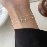 Браслет многослойный тонкий с сердечком серебристый