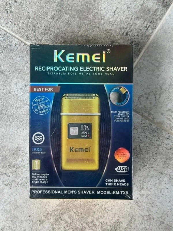 Электробритва с выдвижным триммером KM-TX9 Электробритва с выдвижным триммером KM-TX9