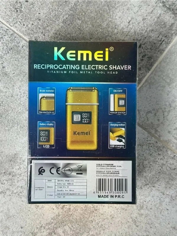 Электробритва с выдвижным триммером KM-TX9 Электробритва с выдвижным триммером KM-TX9